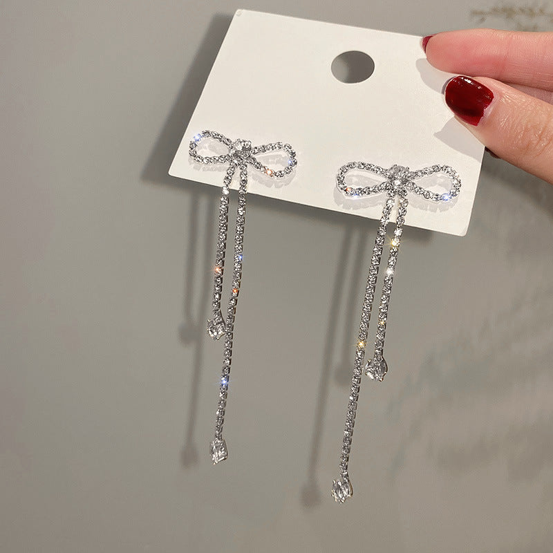 Diamond-Treated Drop Earrings – Bow & Tassel Design - Trenvo